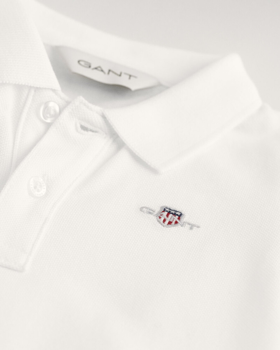 baby shield piqué rugger - white